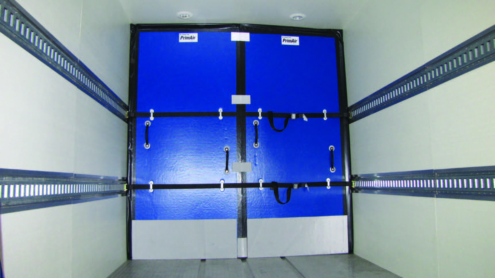 Insulated bulkhead installed in a refrigerated vehicle